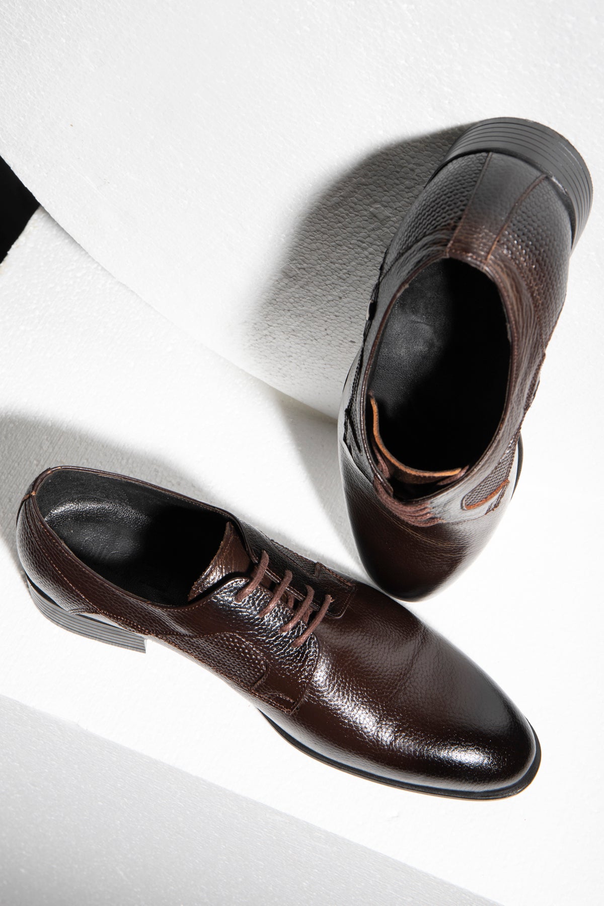 Pair of brown leather dress shoes