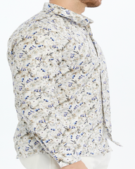 Men floral patterned printed shirt on a brownish background