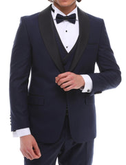 Men navy tuxedo with satin details and a shawl lapel, including a white shirt and bow tie.