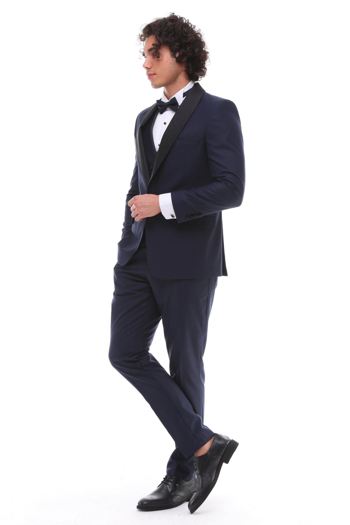 Navy tuxedo suit with satin details and a shawl lapel
