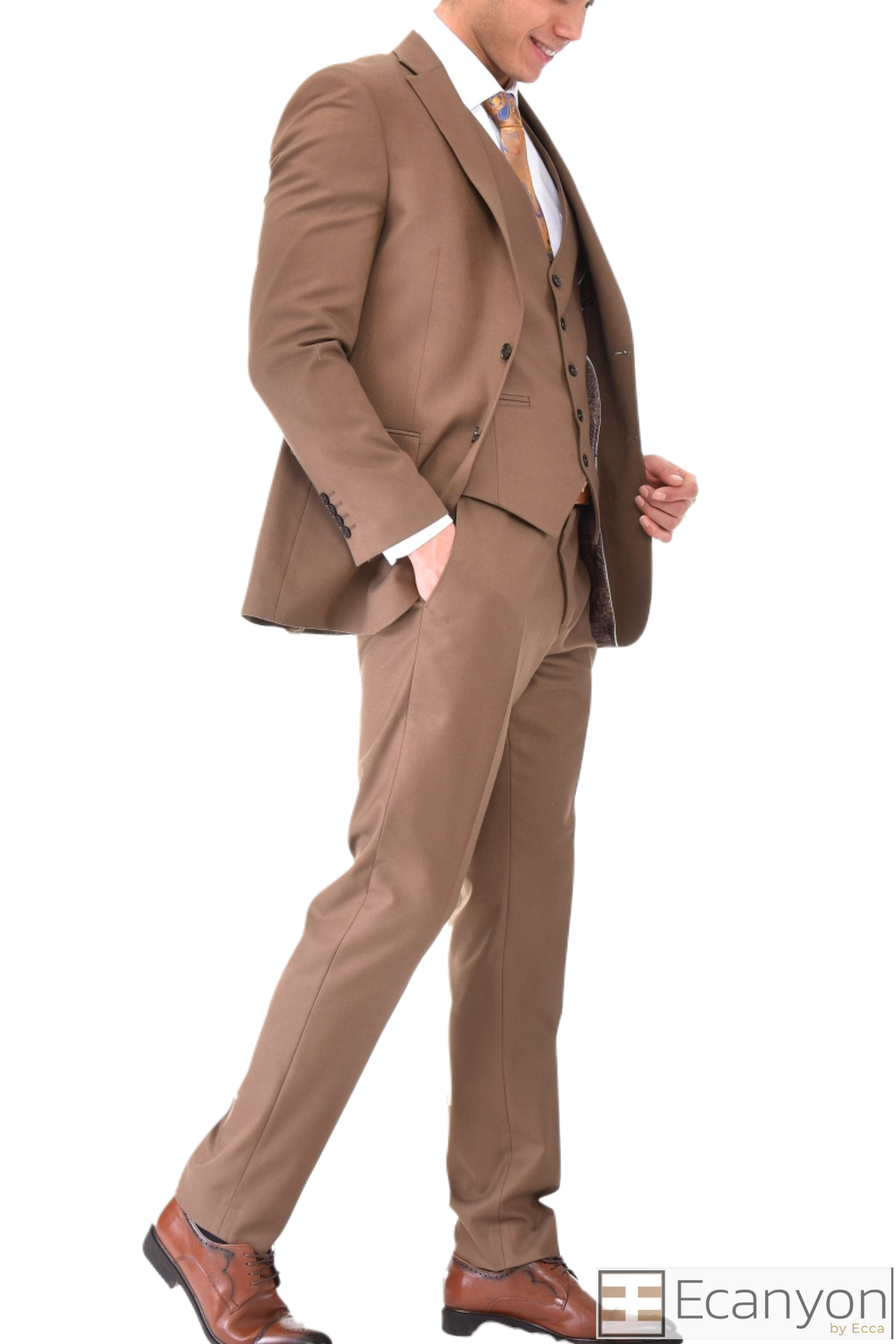 Tan Plain 3 Piece Suit, A timeless a plain tan quality thick fabric three piece suits that can be styled up for special events or styled down for the office. The matching quality a plain tan waistcoat and trousers are paired with a plain tan blue suit jacket. You’ll love the patterned lining panels on this suit, especially the one in the jacket’s breast pocket which doubles up as a pocket square.Master Tailored Fit 3 Piece Suit